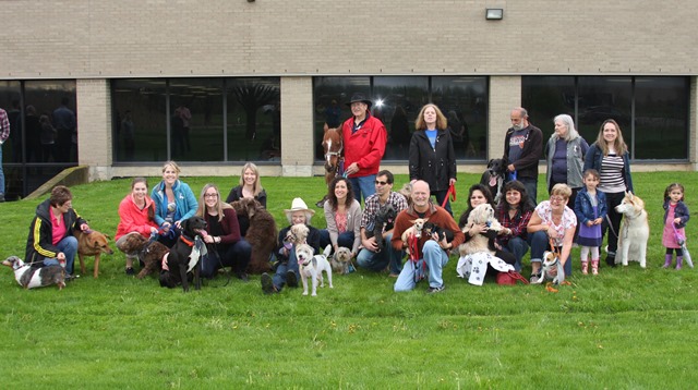 OES team with dogs in front of OES office