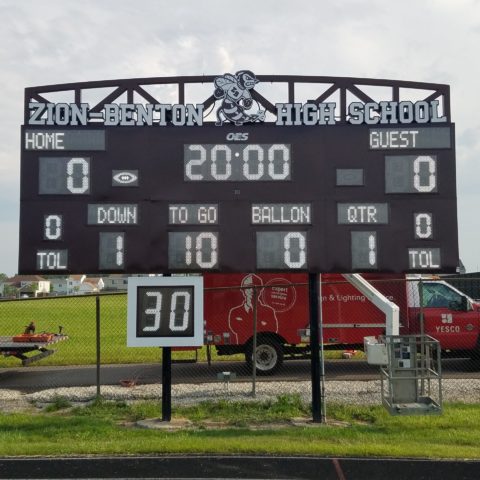 football scoreboard showing a play clock time