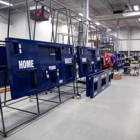 scoreboards being built in a factory