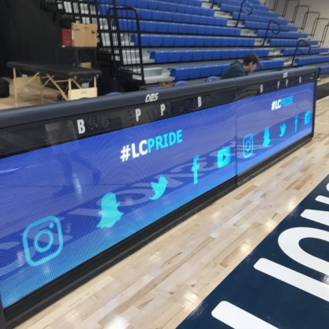 Scoring Tables on gymnasium sidelines