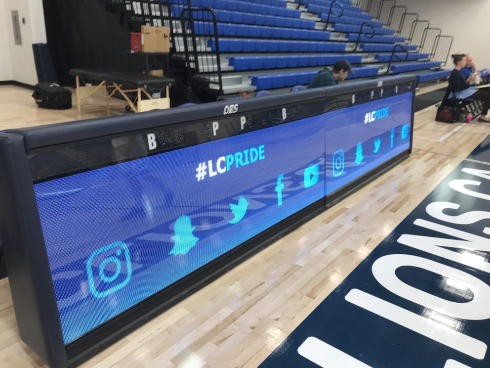 Scoring Tables on gymnasium sidelines