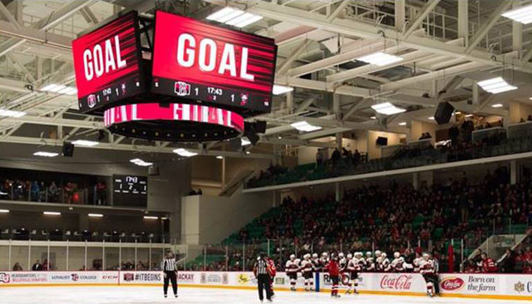 video scoreboard at centre ice is showing the work GOAL indicting a team just scored