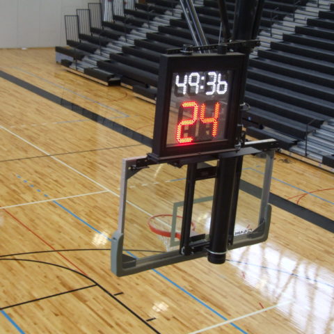 scoreboard and timer over basketball net