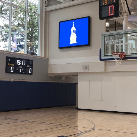 Video scoreboard on the wall in a gym