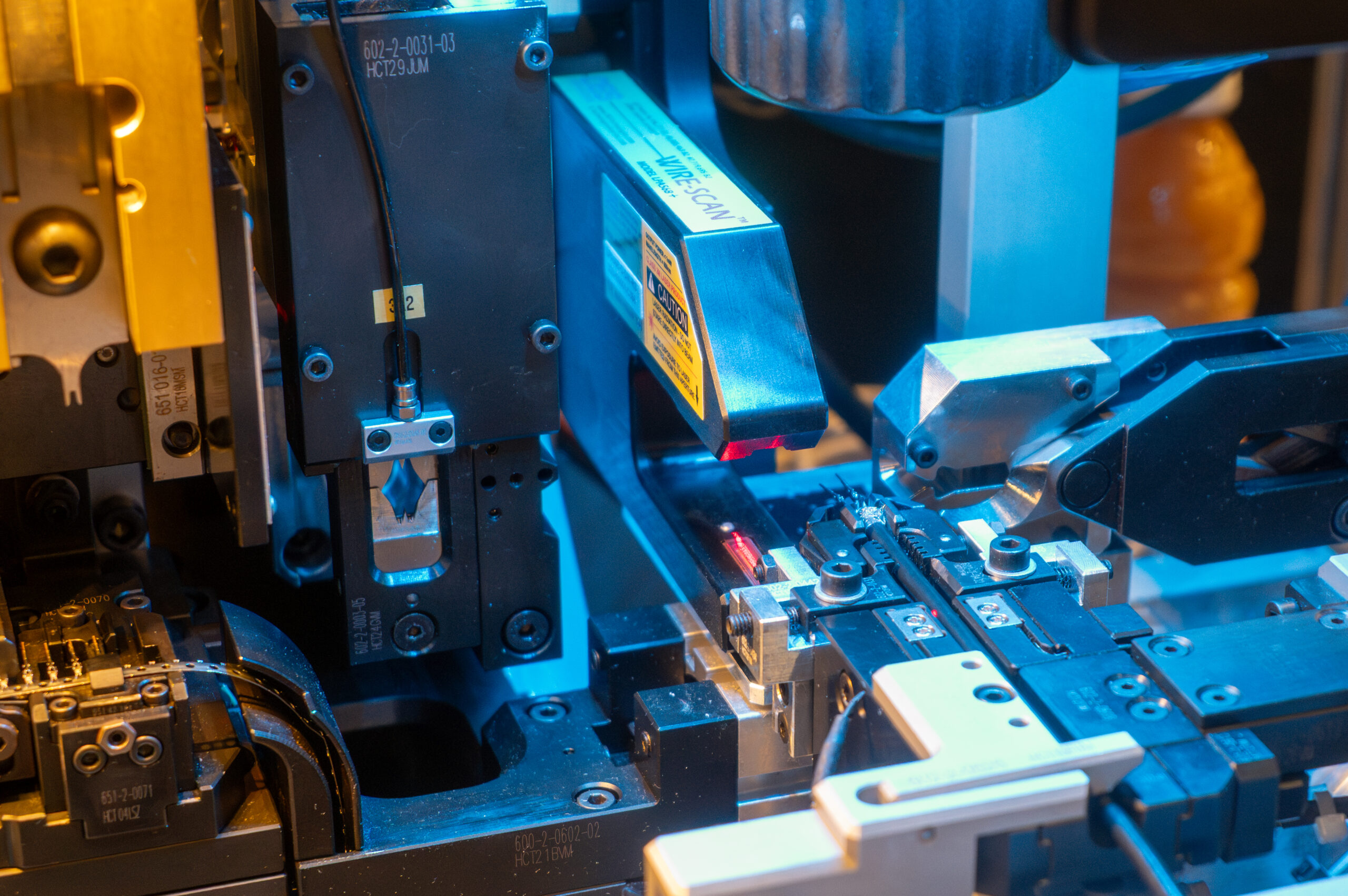 EWPTE 2025 May-3 a close-up of an automated press with a laser profile analyzer.