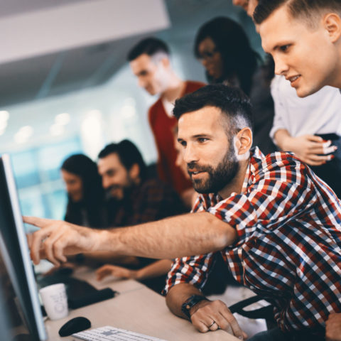 Programmer working in a software developing company office